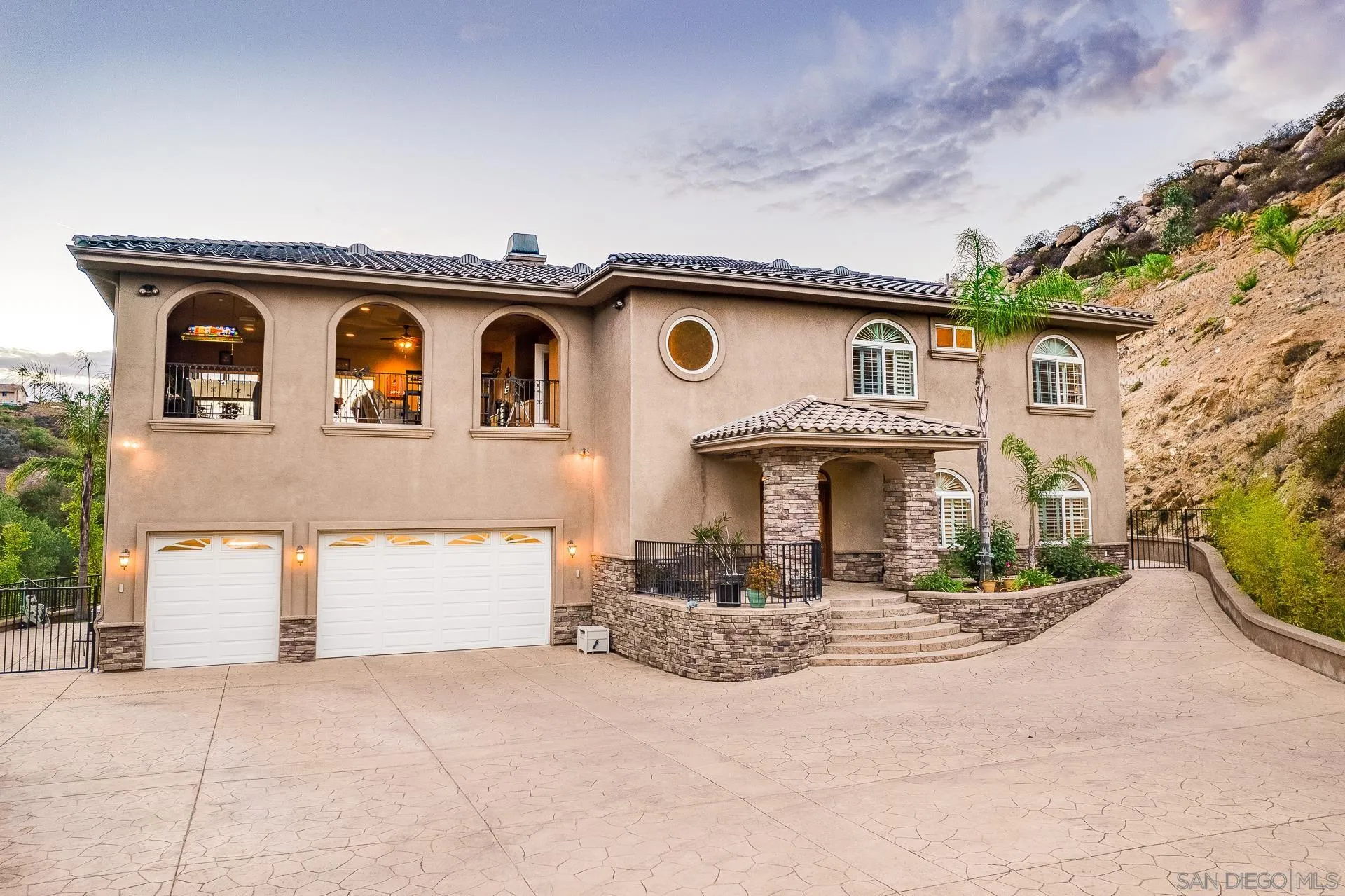 15380 Oak Canyon Road Poway, CA 92064 - Photo 6 of 52 a front view of a house with garden