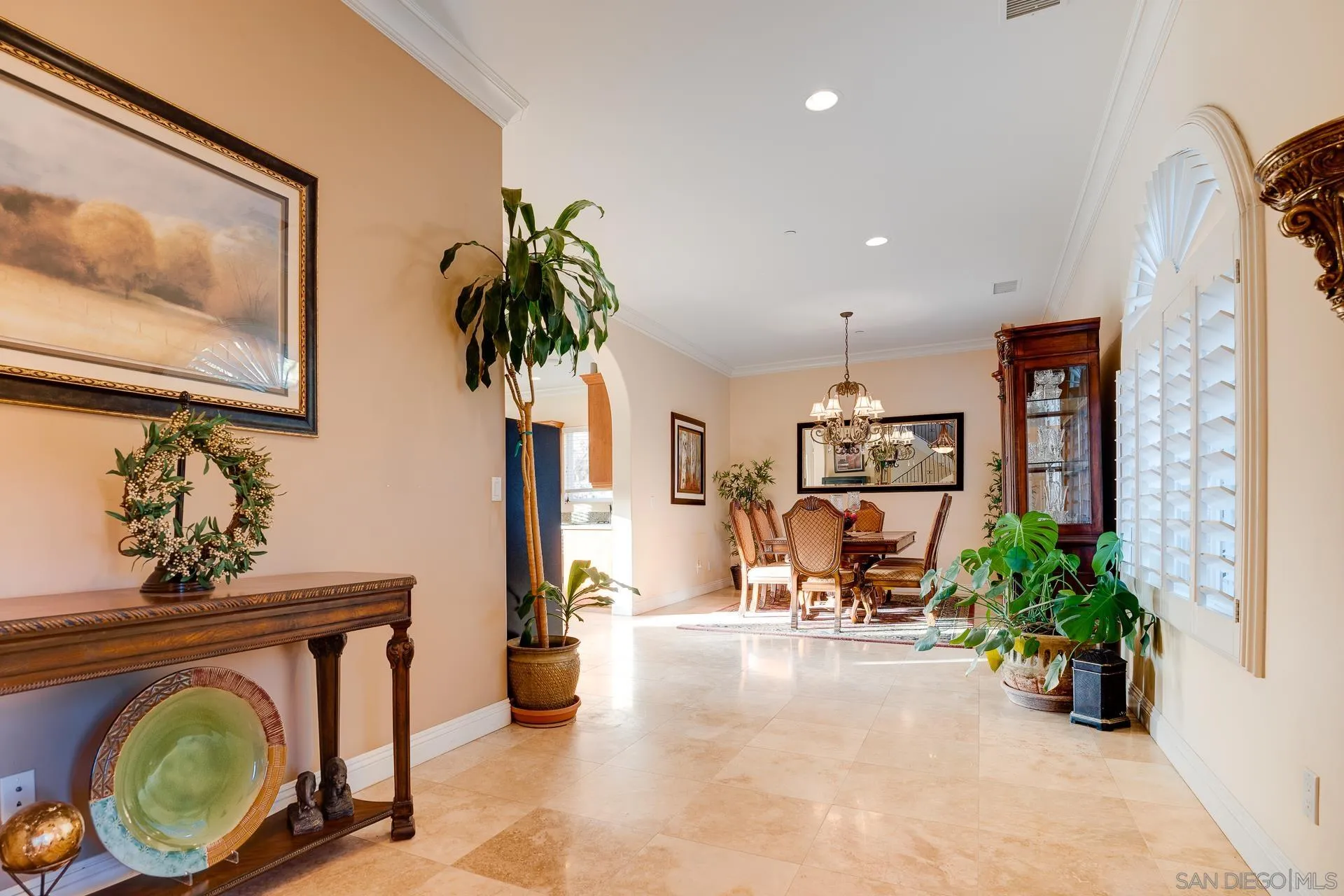15380 Oak Canyon Road Poway, CA 92064 - Photo 8 of 52 a living room with furniture and a potted plant