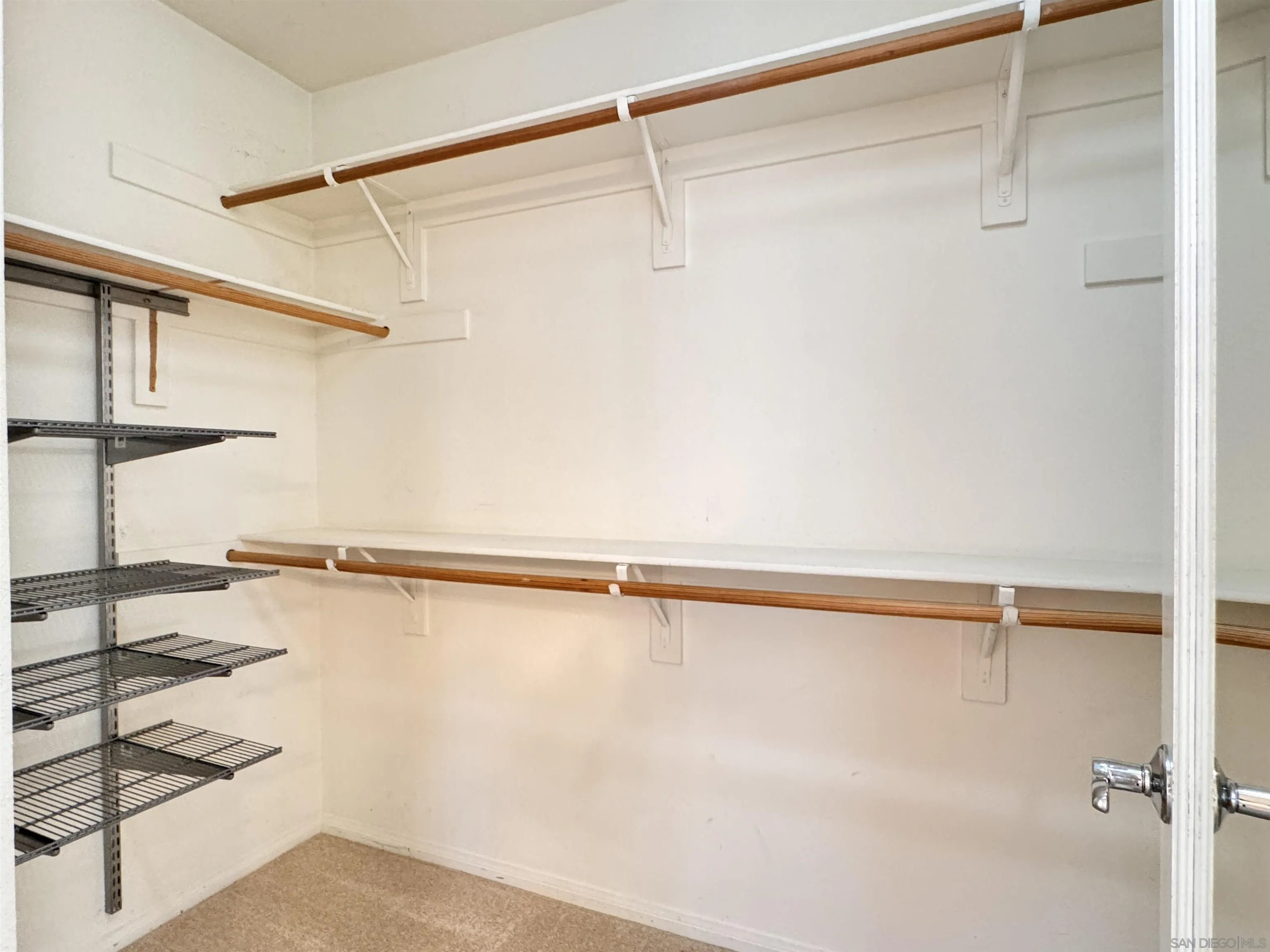 10430 Shelborne Street, Unit 37 San Diego, CA 92127 - Photo 12 of 27 a view of a room with racks on the wall