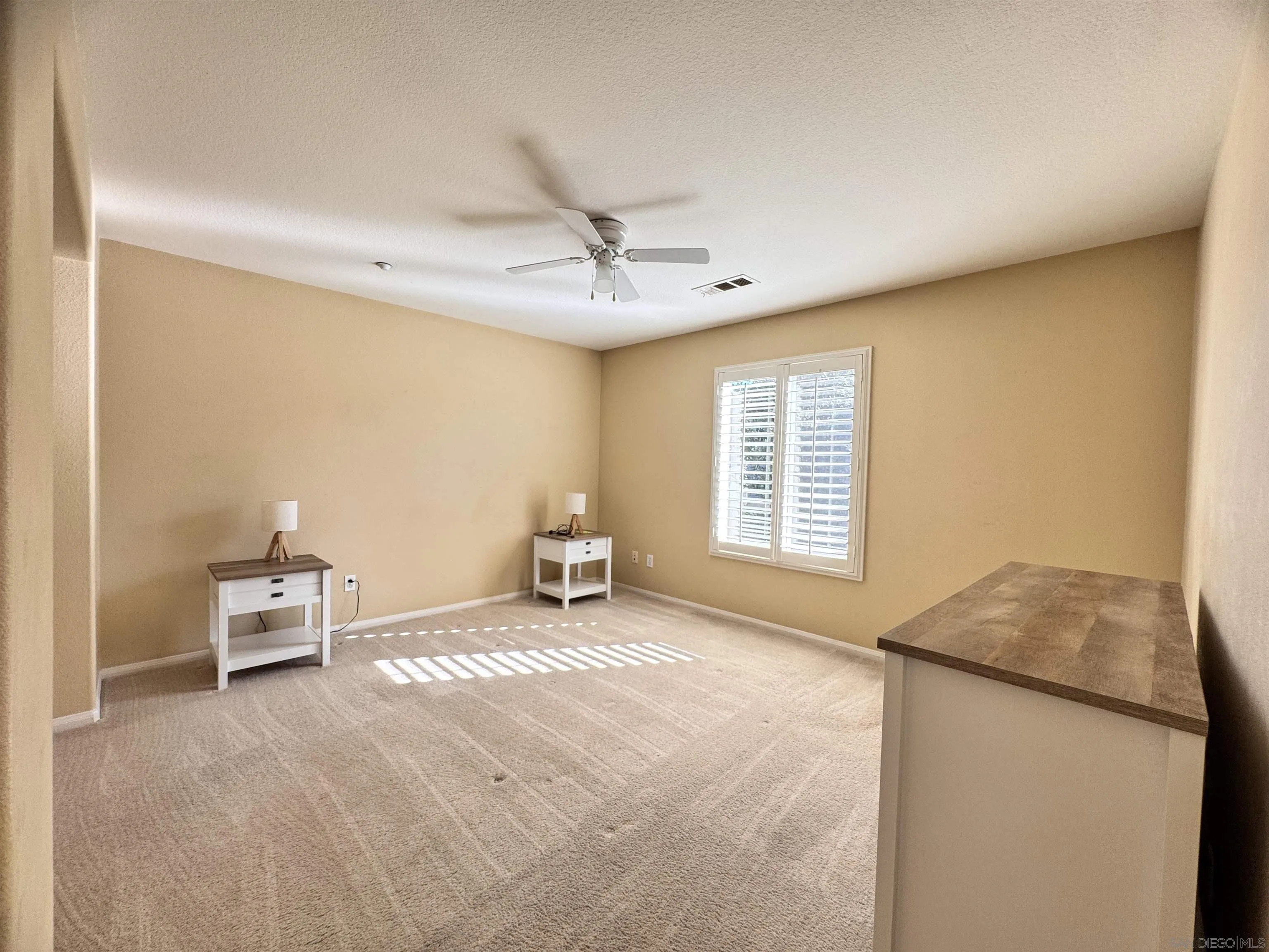 10430 Shelborne Street, Unit 37 San Diego, CA 92127 - Photo 18 of 27 a living room with furniture and a chandelier