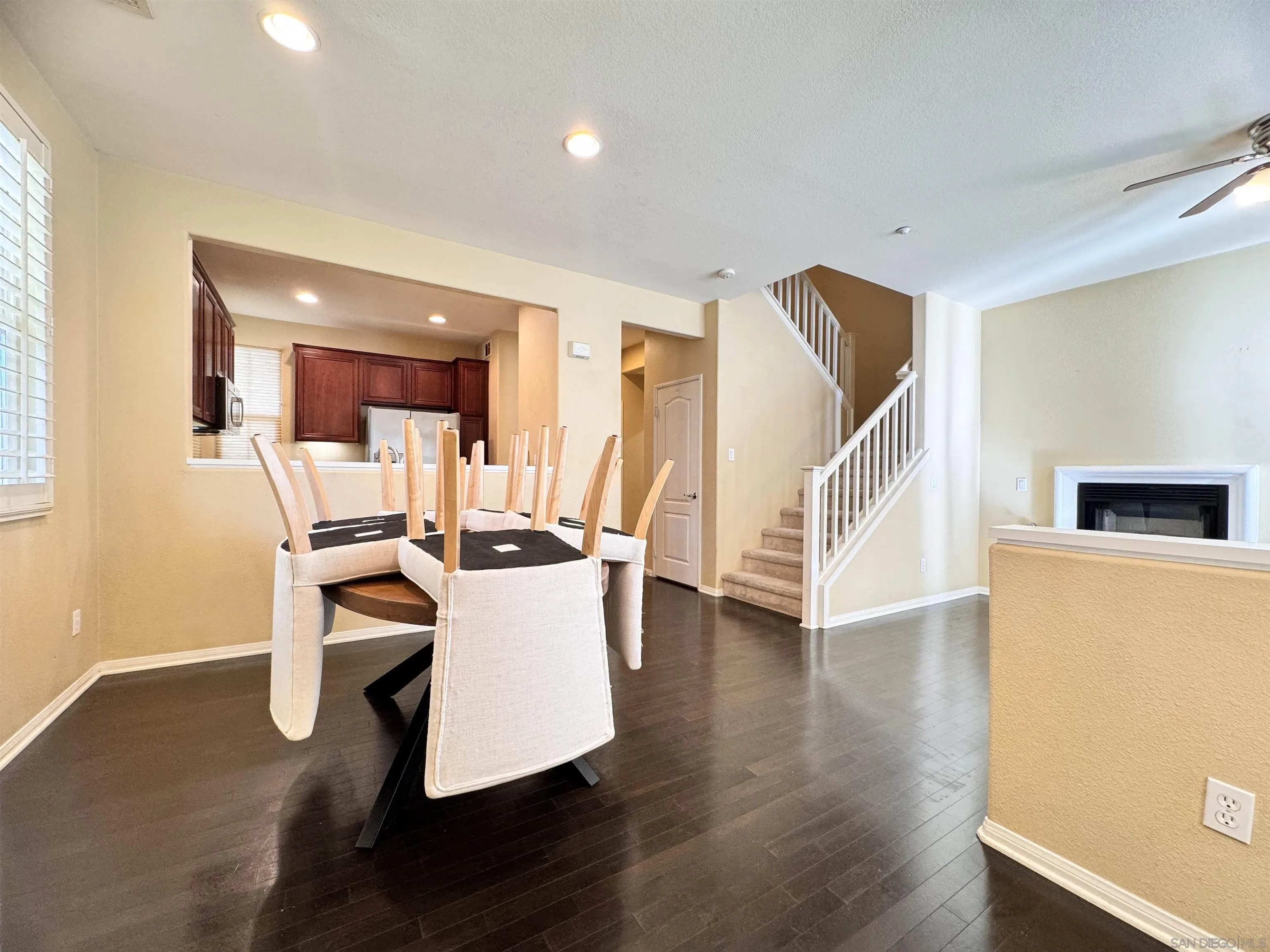 10430 Shelborne Street, Unit 37 San Diego, CA 92127 - Photo 2 of 27 a view of a dining room with furniture and wooden floor
