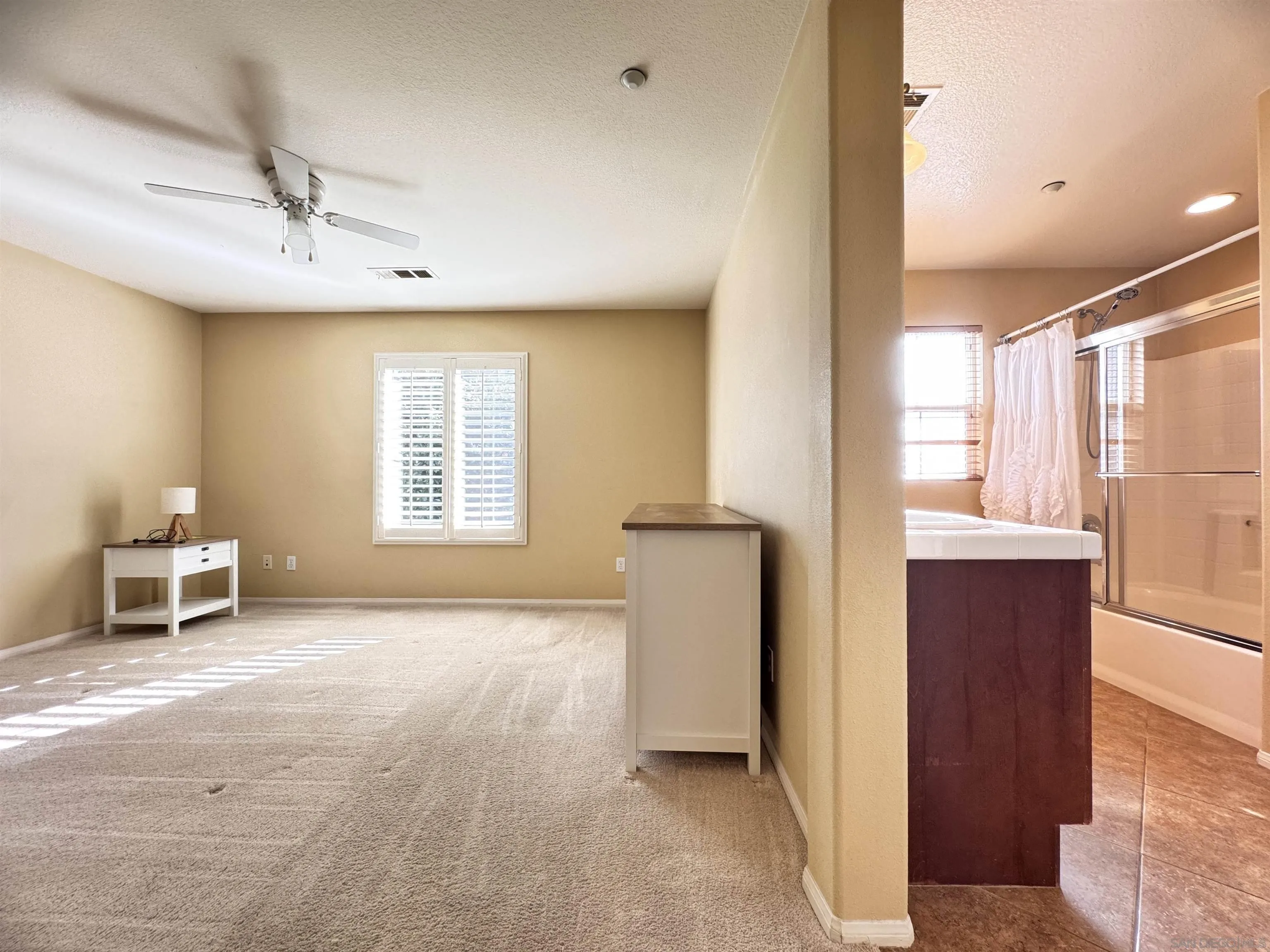 10430 Shelborne Street, Unit 37 San Diego, CA 92127 - Photo 21 of 27 a view of a livingroom with a window