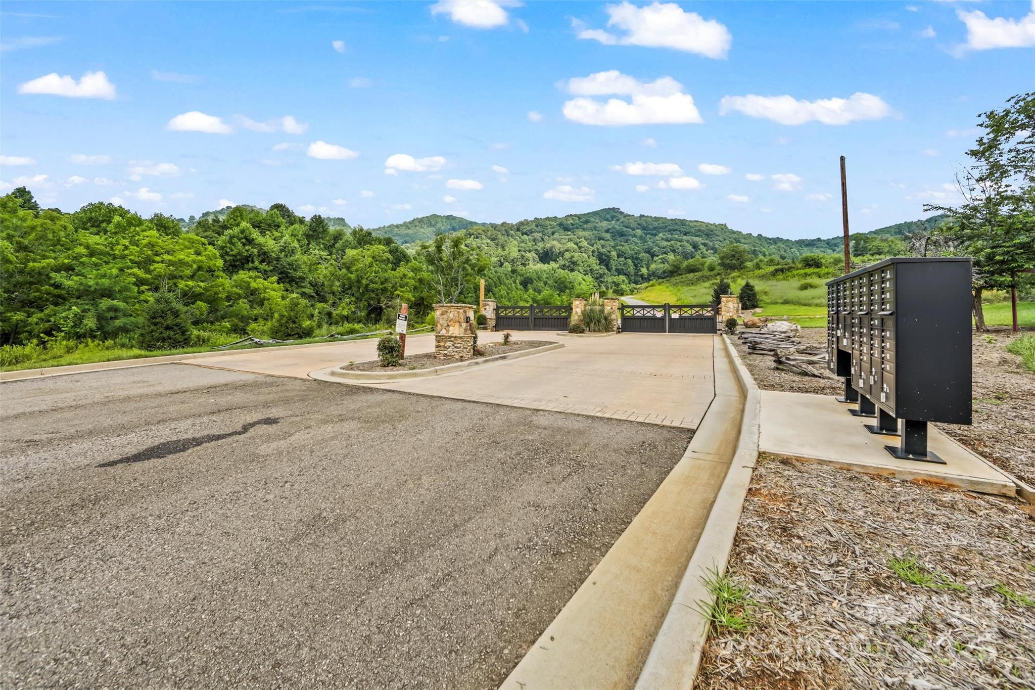 9999 Blue Ridge View Drive Canton, NC 28716 - Photo 15 of 18 a view of a street with a building in the background