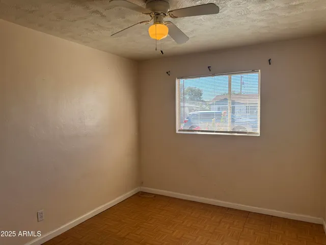 a bathroom with a tub a sink and a shower
