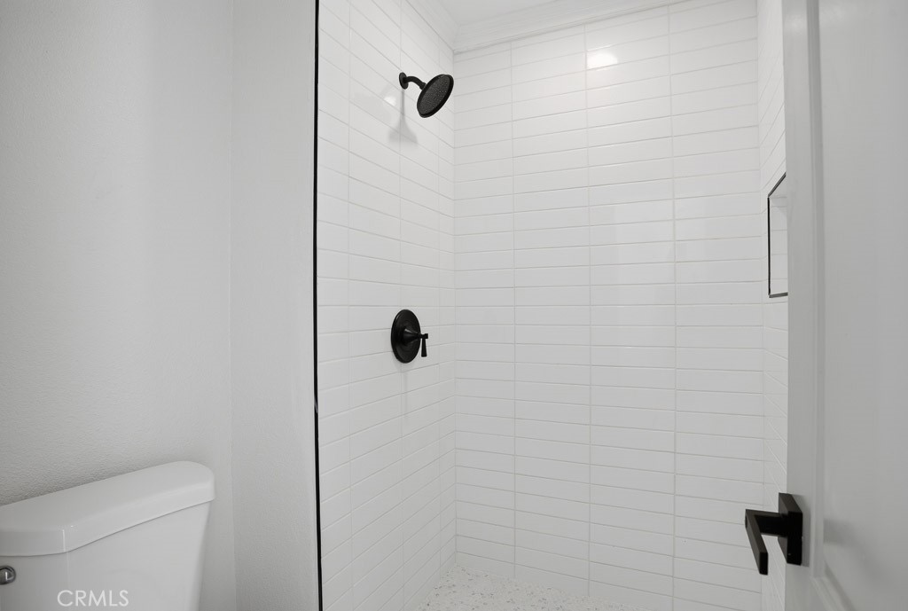 7051 Idyllwild Lane Riverside, CA 92503 - Photo 19 of 36 a bathroom with a shower