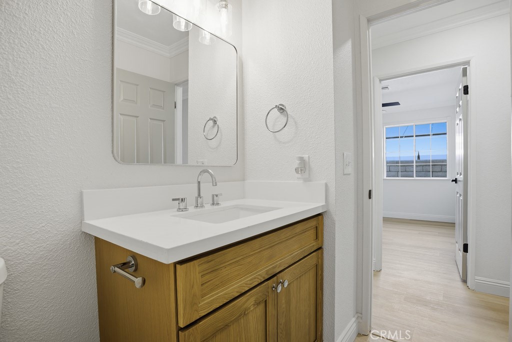 7051 Idyllwild Lane Riverside, CA 92503 - Photo 24 of 36 a bathroom with a sink and a mirror