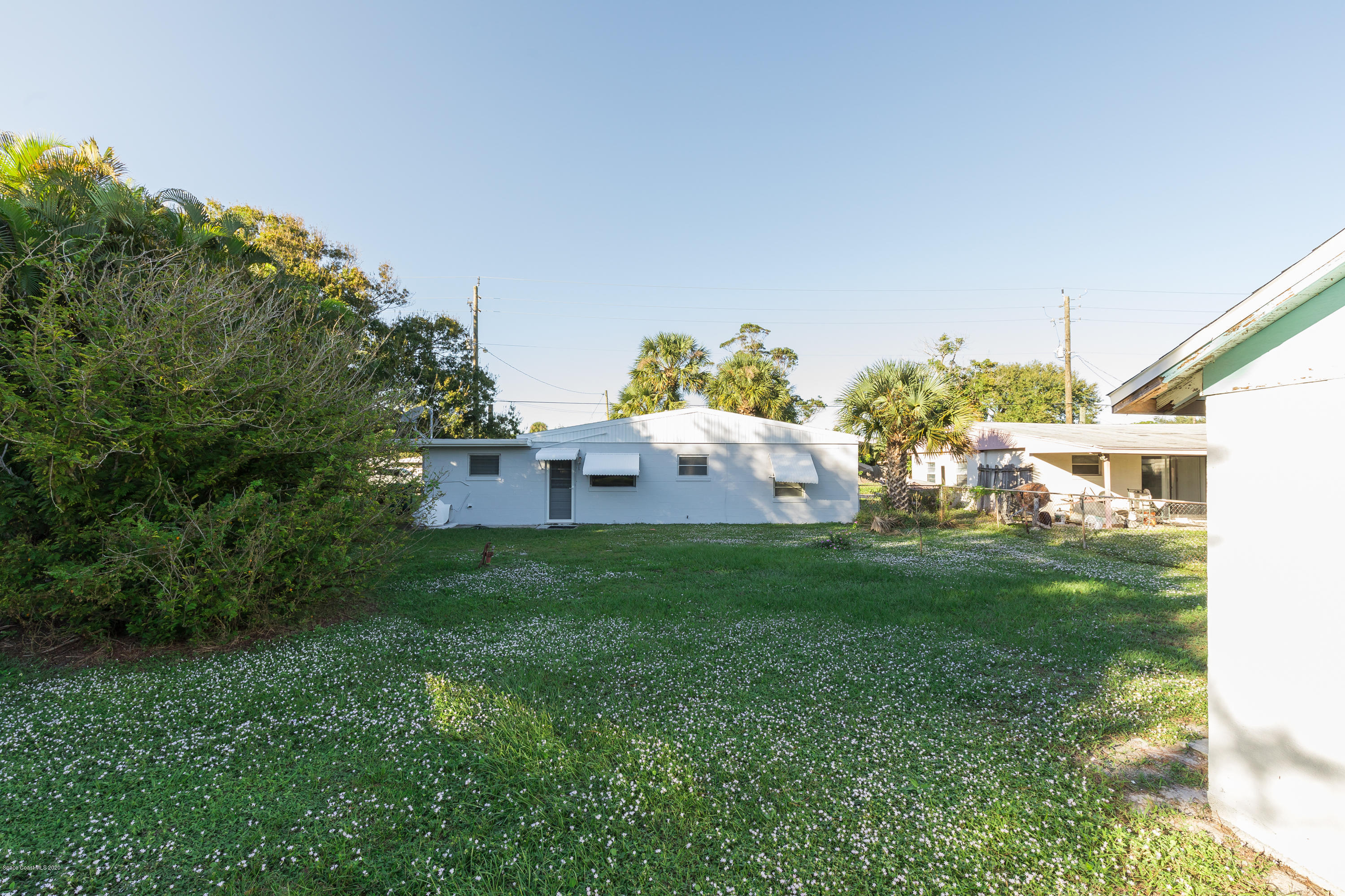 115 Cherry Street Melbourne, FL 32901 - Photo 12 of 12 a view of a house with a backyard