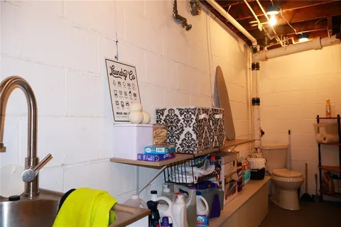 a view of balcony with furniture