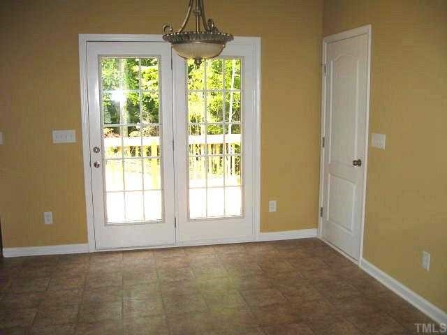2529 Friendly Trail Raleigh, NC 27610 - Photo 2 of 12 a view of an empty room with a window