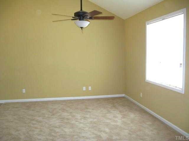 2529 Friendly Trail Raleigh, NC 27610 - Photo 5 of 12 a view of a room with a window