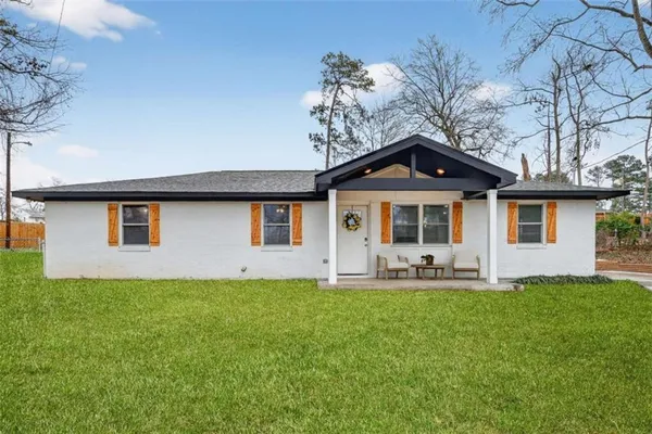 a front view of a house with patio