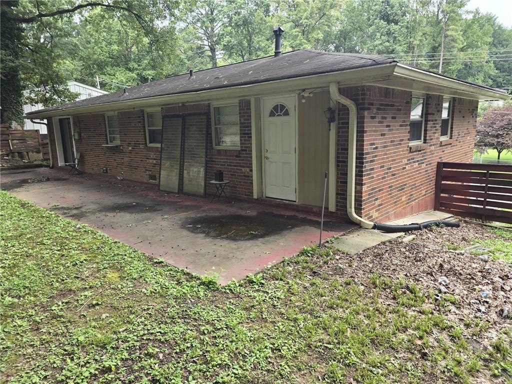 3276 Pin Oak Circle Atlanta, GA 30340 - Photo 20 of 22 a front view of a house with garden
