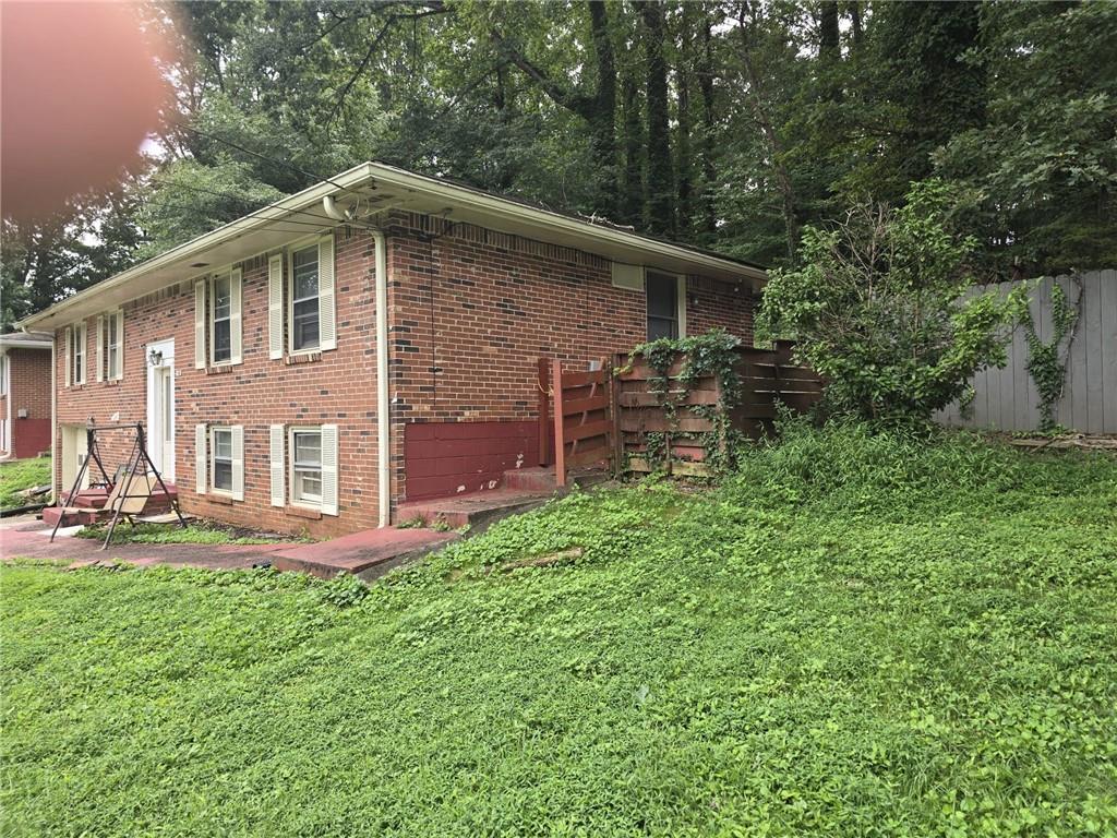 3276 Pin Oak Circle Atlanta, GA 30340 - Photo 21 of 22 a front view of a house with a yard