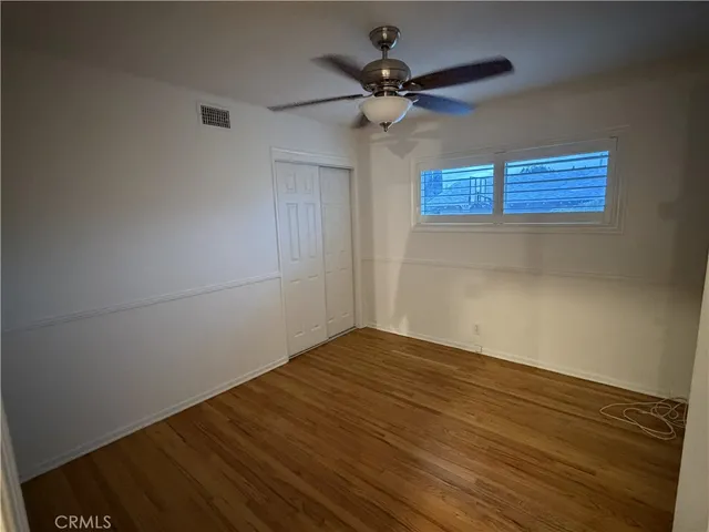 a view of a house with a yard and a garage