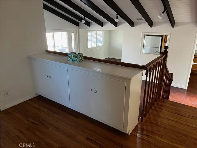 a view of bathroom with sink and mirror