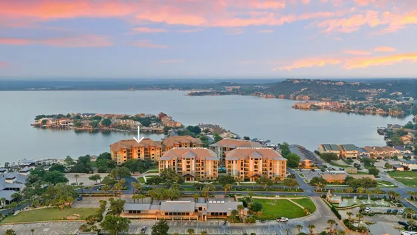 a view of a city and lake