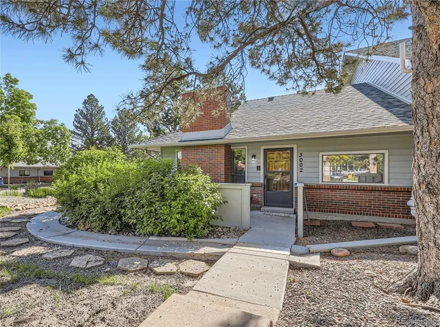 a house view with a garden space