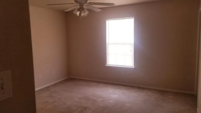 an empty room with a window