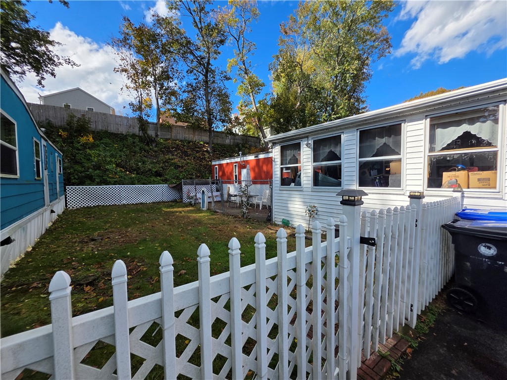 67 Alfa Drive Pawtucket, RI 02860 - Photo 2 of 20 Yard/side view