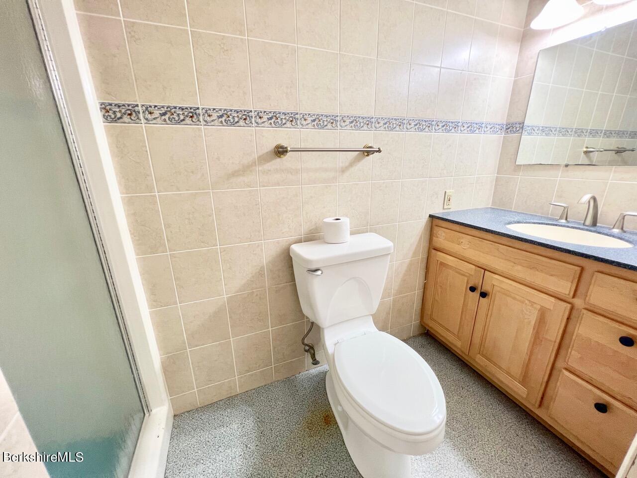 72 Brunell Avenue Lenox, MA 01240 - Photo 16 of 27 a bathroom with a toilet sink and shower