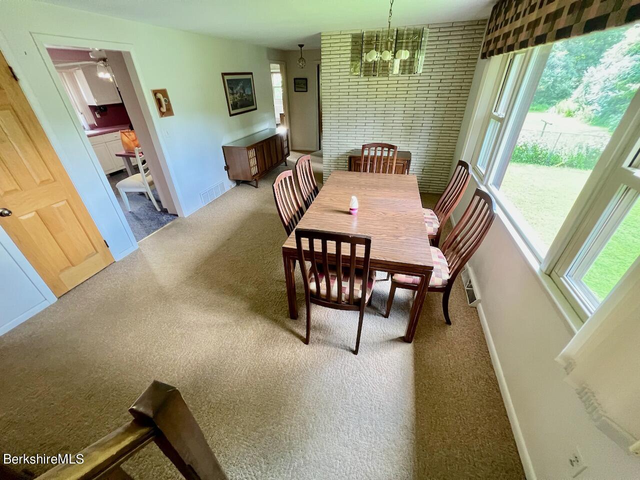 72 Brunell Avenue Lenox, MA 01240 - Photo 17 of 27 a view of a livingroom with furniture window and wooden floor