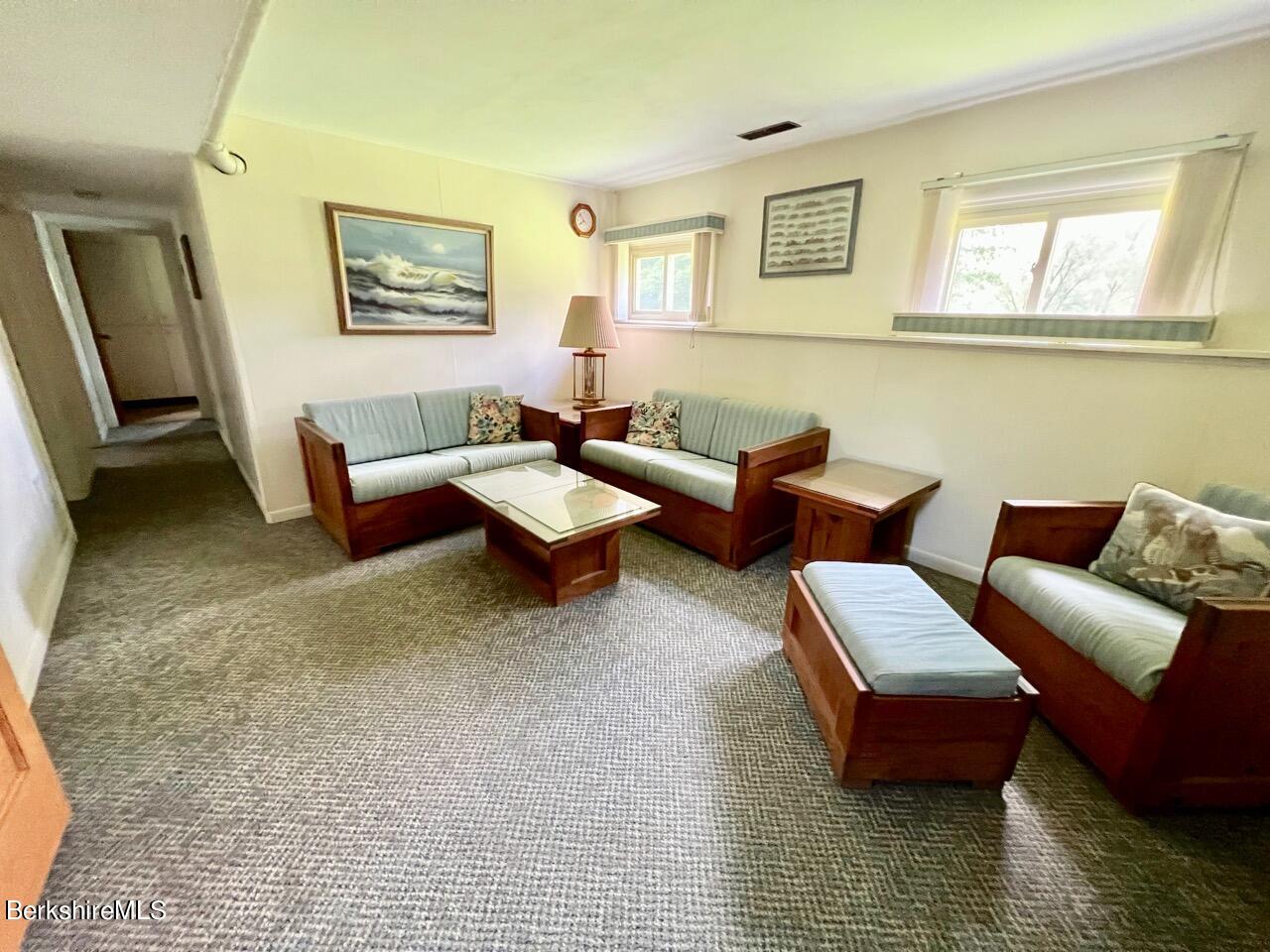 72 Brunell Avenue Lenox, MA 01240 - Photo 7 of 27 a living room with furniture and a rug