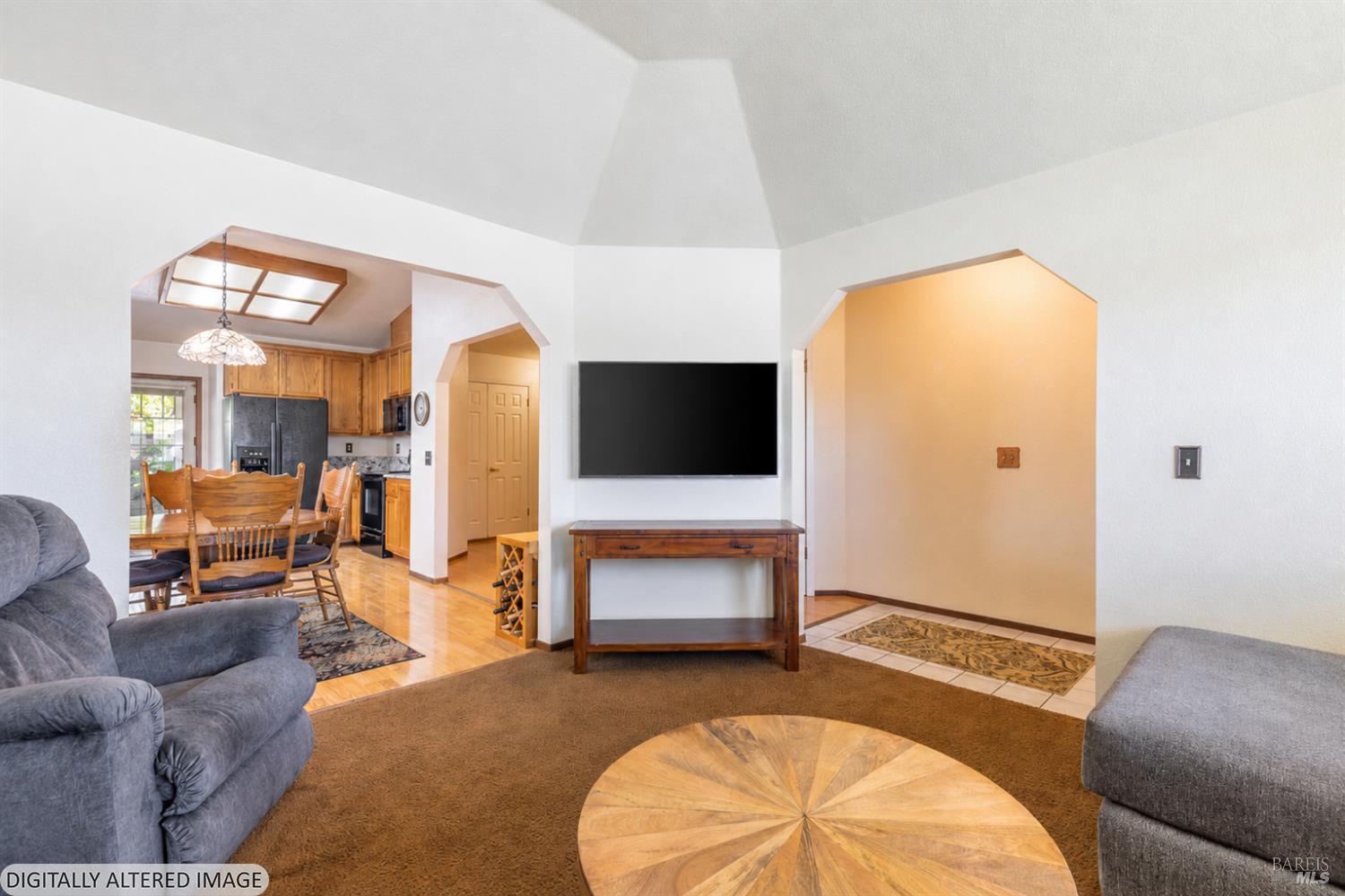 1935 Seville Street Santa Rosa, CA 95403 - Photo 5 of 30 a living room with furniture and a flat screen tv