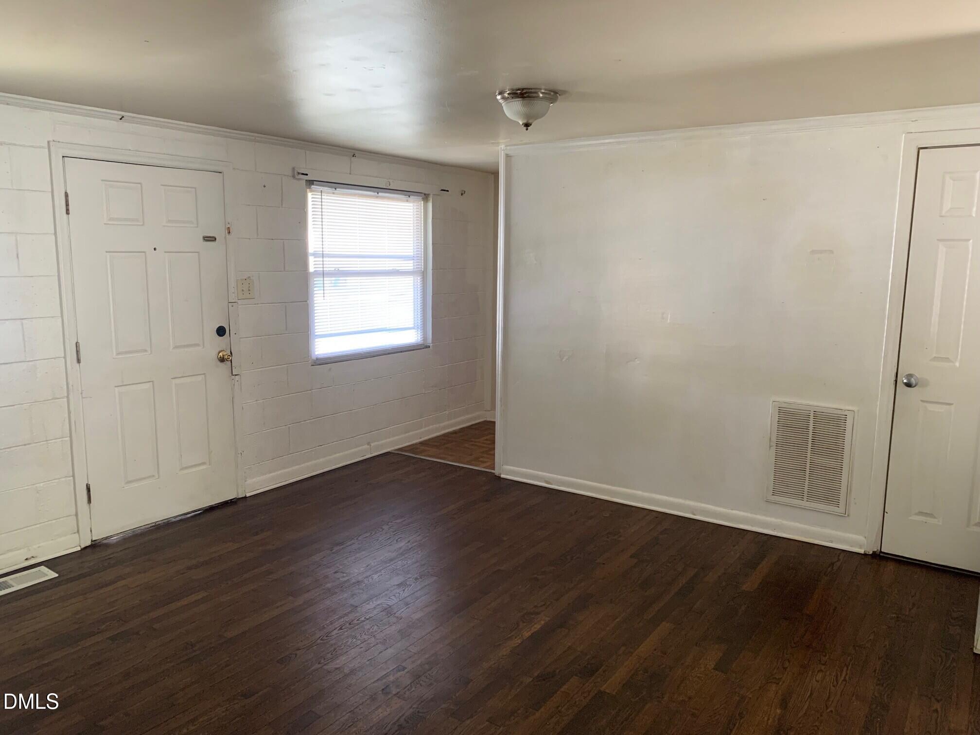 2205 Lafayette Street Durham, NC 27707 - Photo 15 of 17 an empty room with wooden floor and window