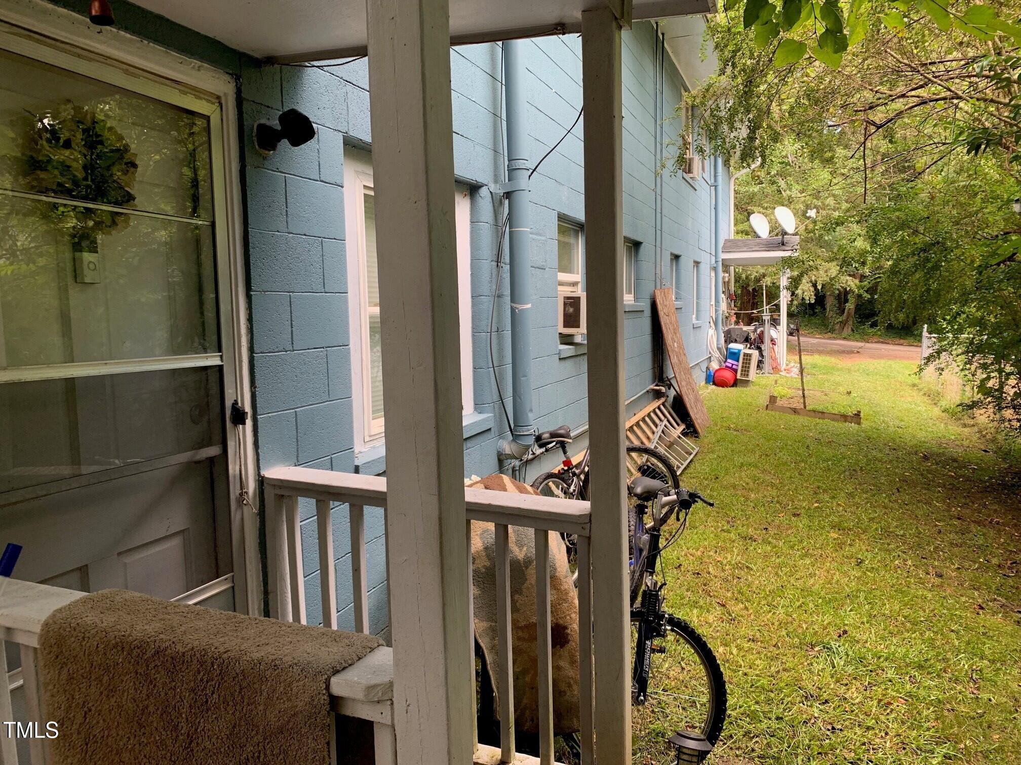 2205 Lafayette Street Durham, NC 27707 - Photo 4 of 17 a view of a balcony with chairs