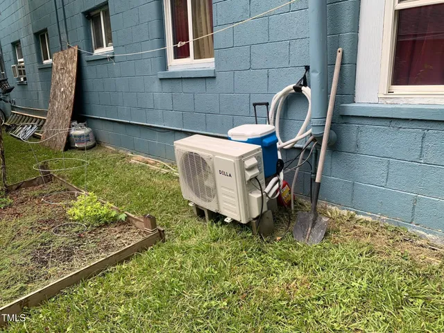 a view of a chairs and table in the patio