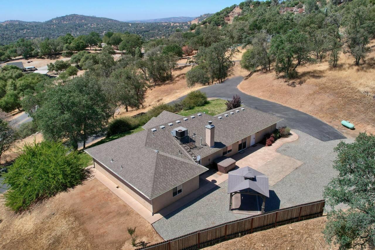 46911 Veater Ranch Road Coarsegold, CA 93614 - Photo 5 of 41 an aerial view of residential houses with outdoor space