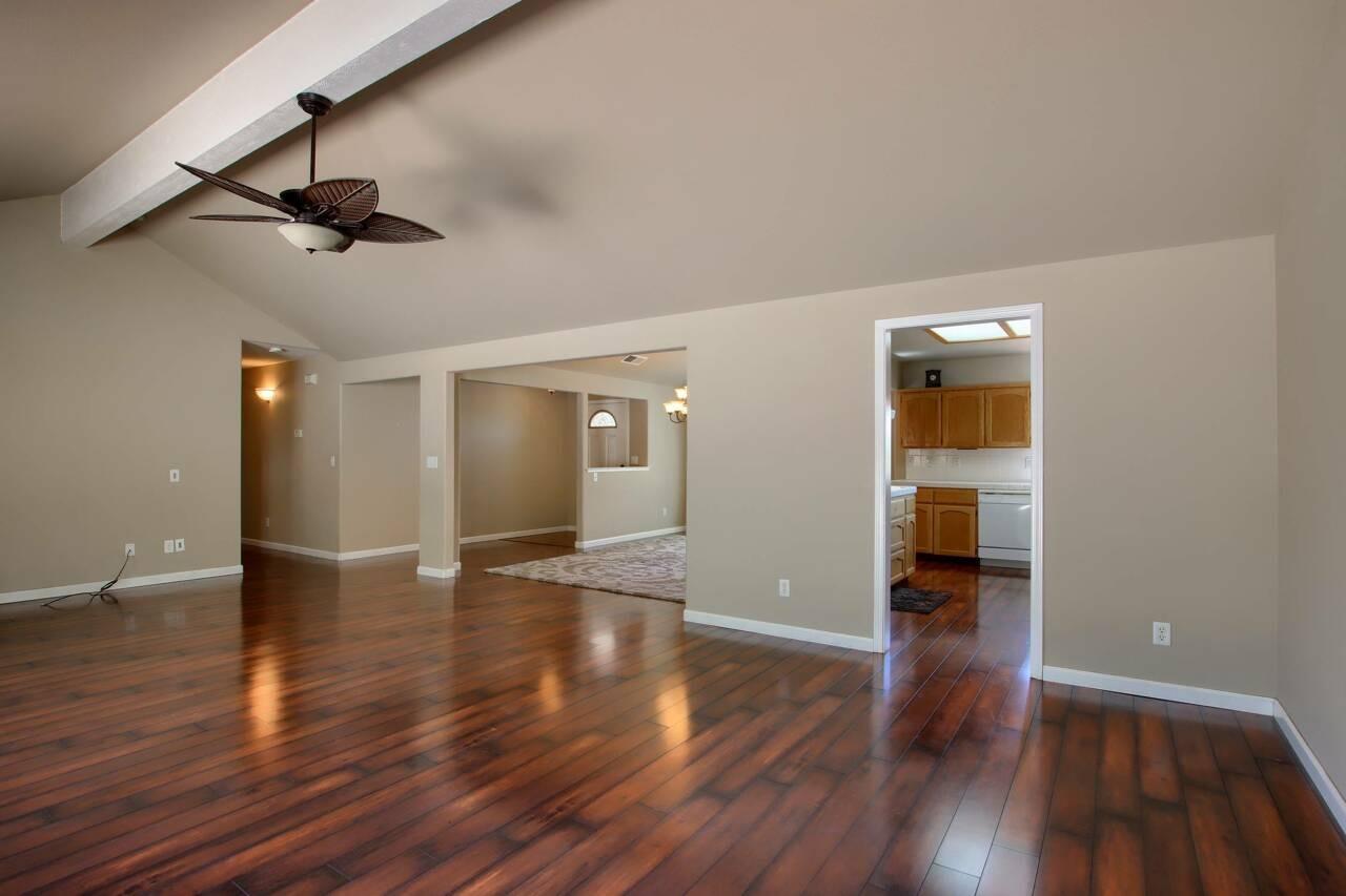 46911 Veater Ranch Road Coarsegold, CA 93614 - Photo 9 of 41 wooden floor in an empty room with a window