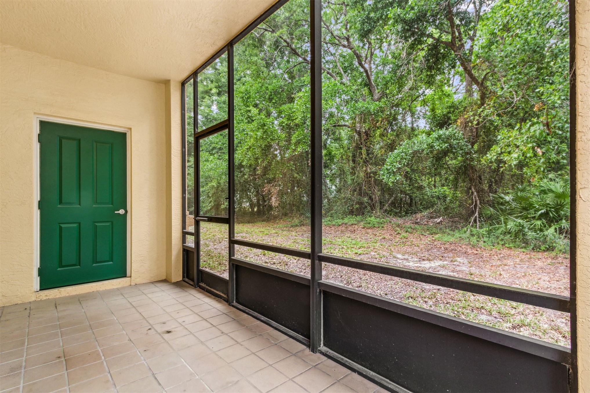 9745 Touchton Road Jacksonville, FL 32246 - Photo 18 of 20 a view of a room with large windows and a outdoor space
