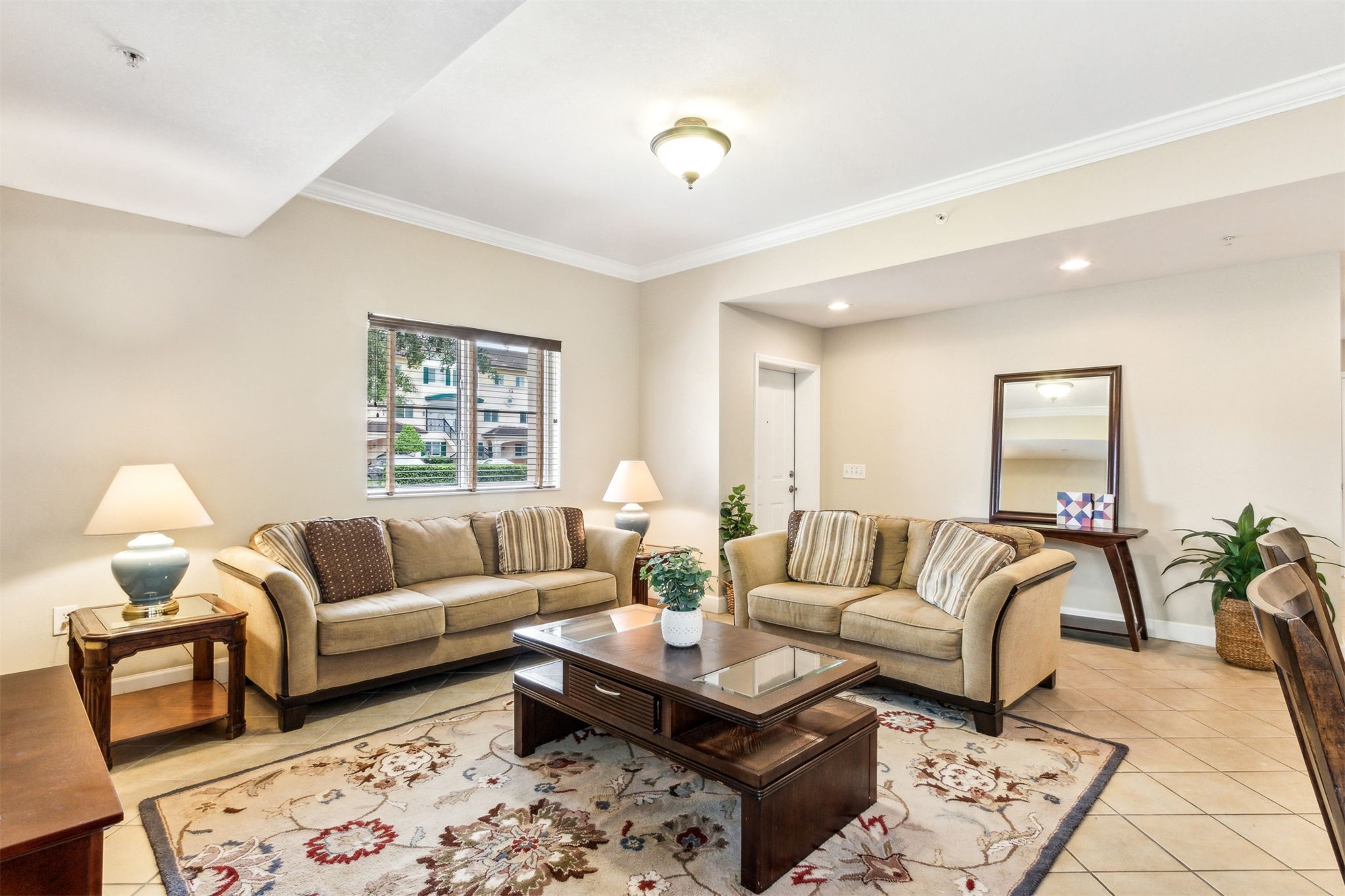 9745 Touchton Road Jacksonville, FL 32246 - Photo 3 of 20 a living room with furniture and painting on the wall