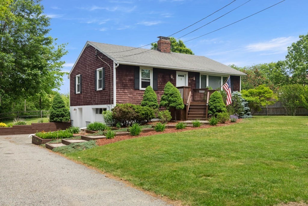 156 Boston Road Newbury, MA 01951 - Photo 2 of 33 a front view of a house with a yard