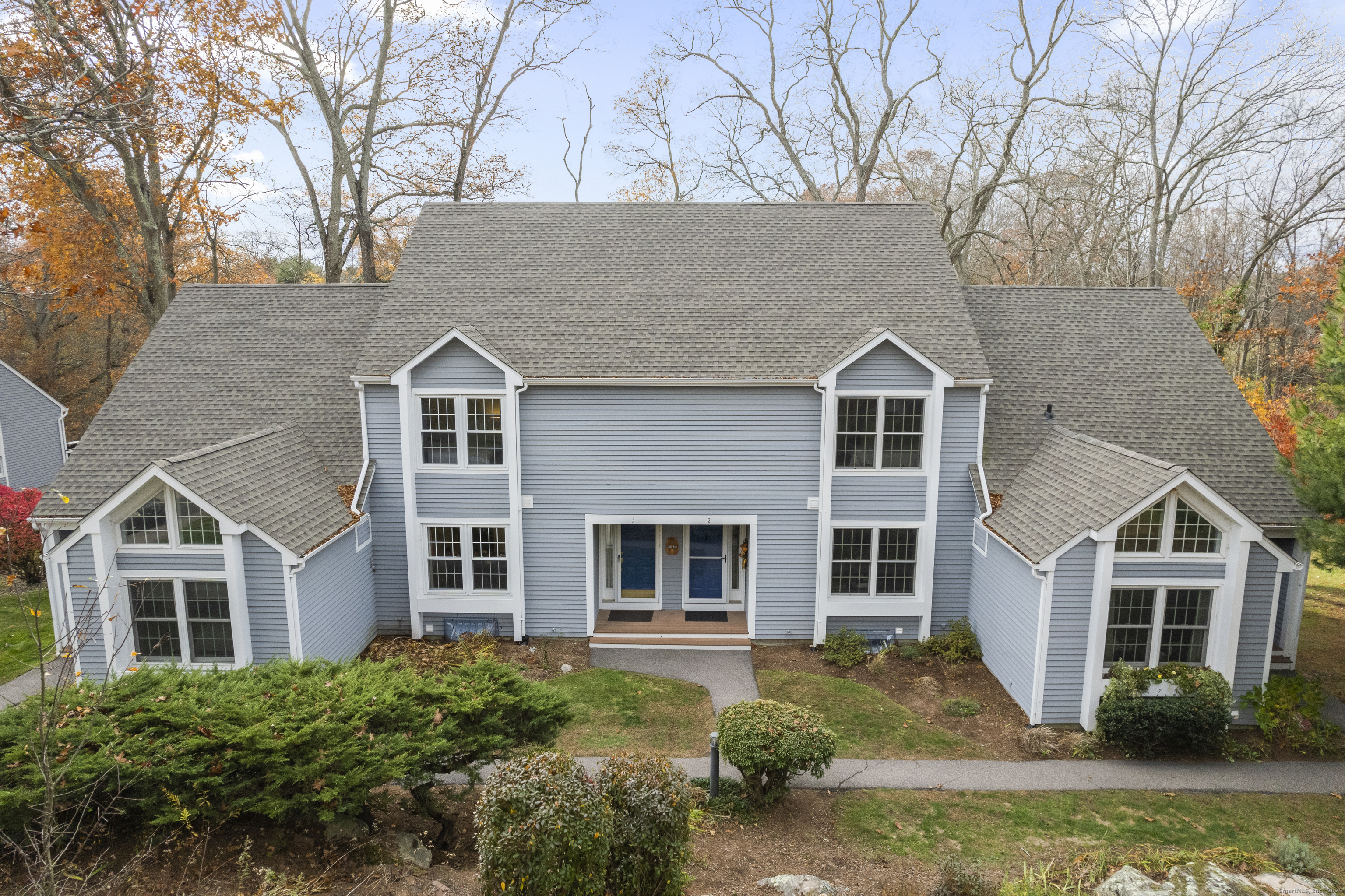 front view of a house with a yard
