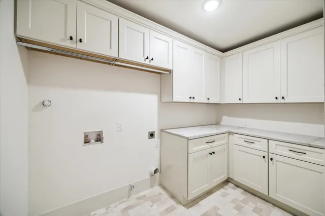 a view of cabinets with wooden floor