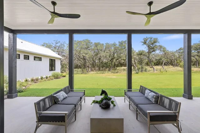 a outdoor living space with furniture and garden view