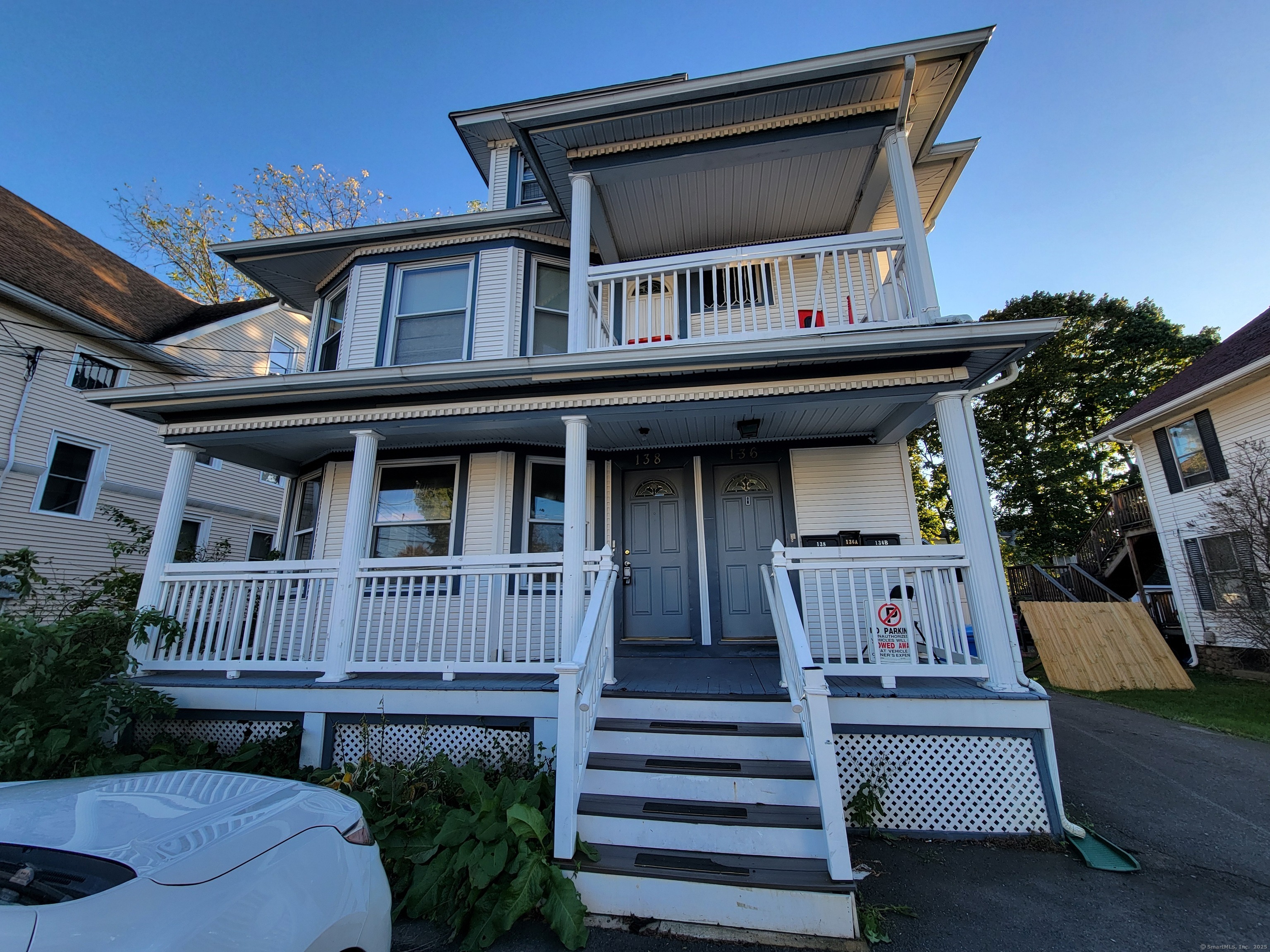138 Federal Street Bristol, CT 06010 - Photo 1 of 17 a front view of a house with entryway and deck
