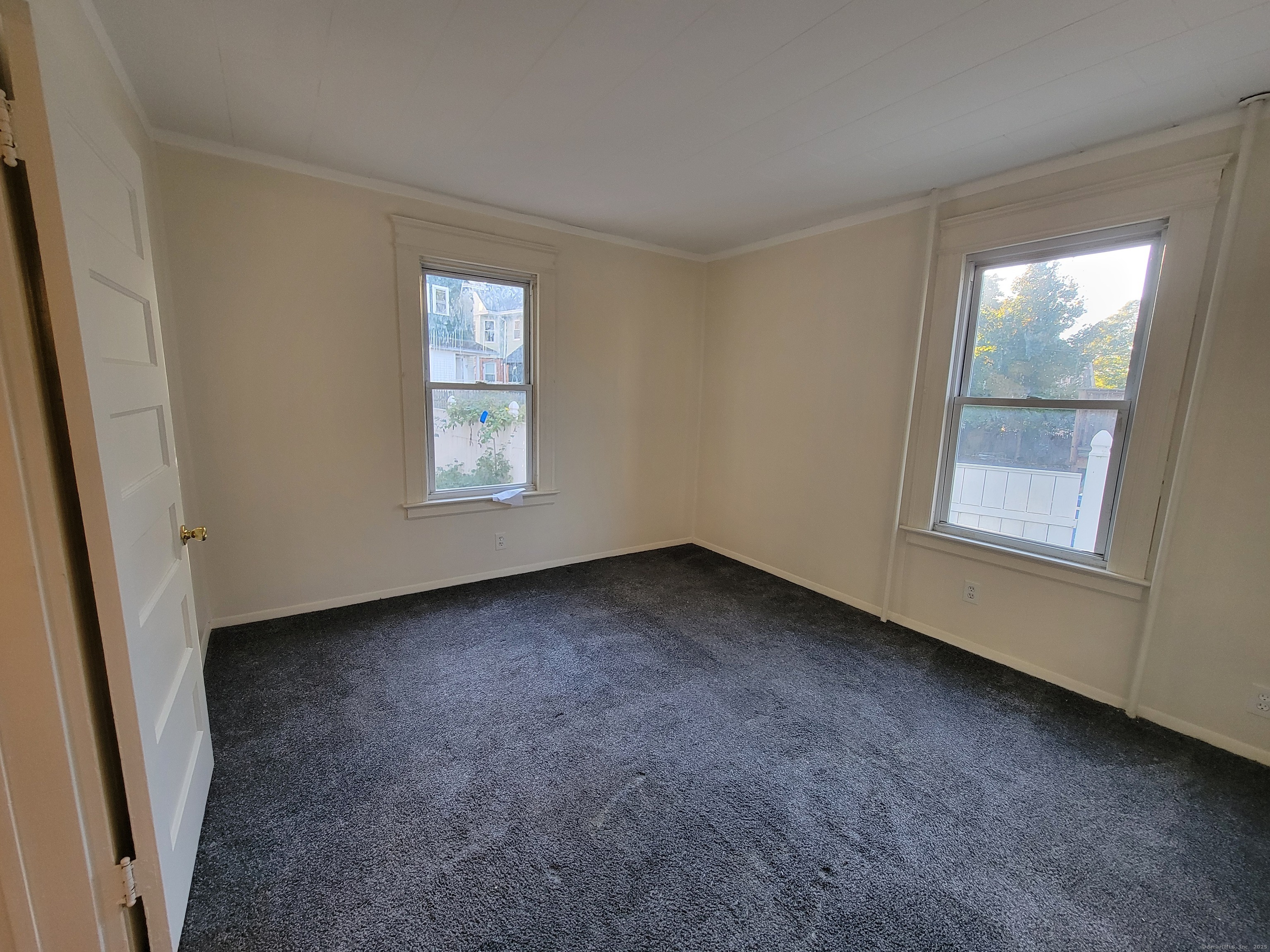 138 Federal Street Bristol, CT 06010 - Photo 17 of 17 an empty room with windows