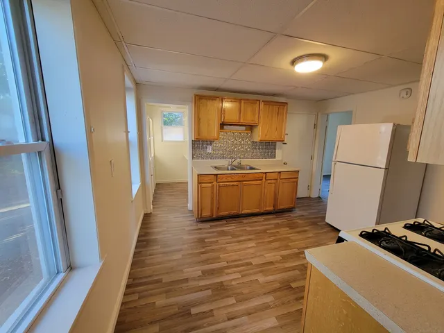 a room with storage and a sink