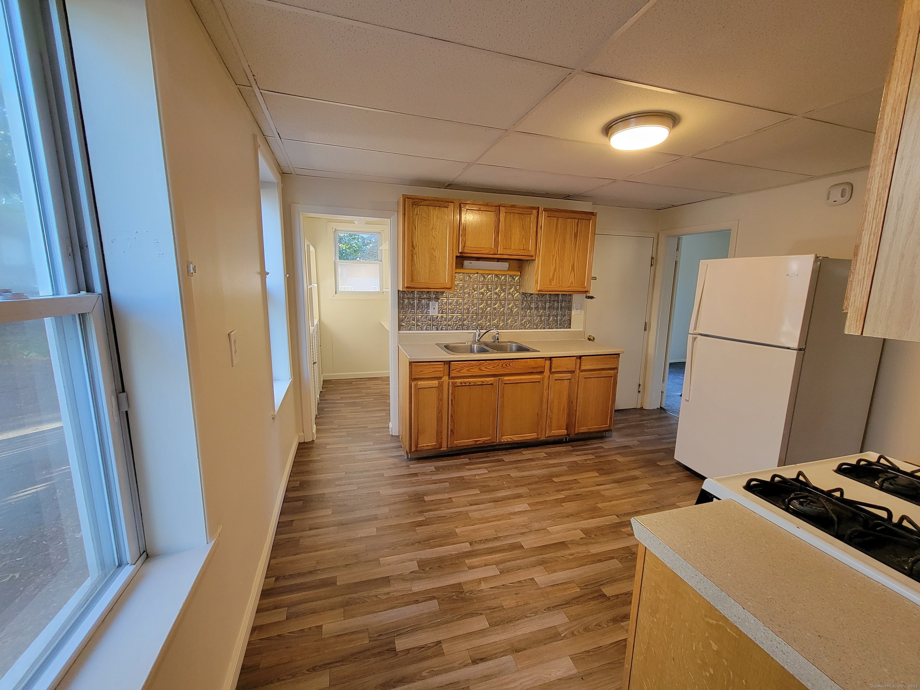 138 Federal Street Bristol, CT 06010 - Photo 9 of 17 a room with storage and a sink