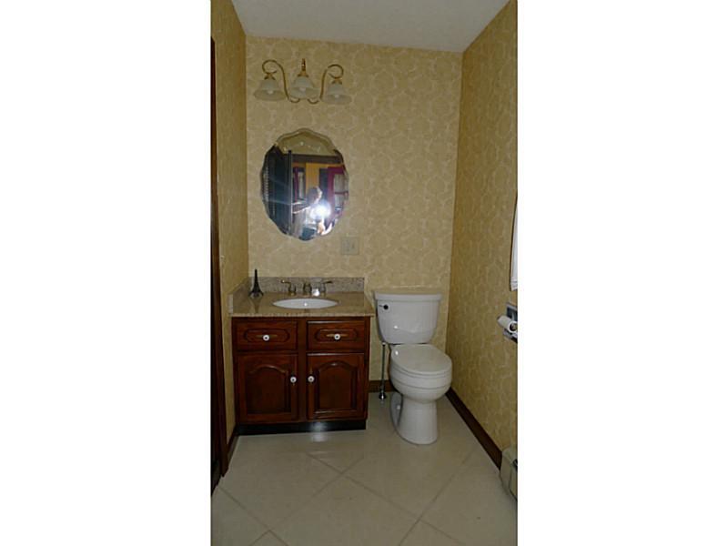 123 Belanger Road Jay, ME 04239 - Photo 27 of 34 Bathroom. Half bath on the first floor.