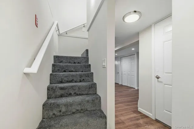 a view of an entryway with staircase