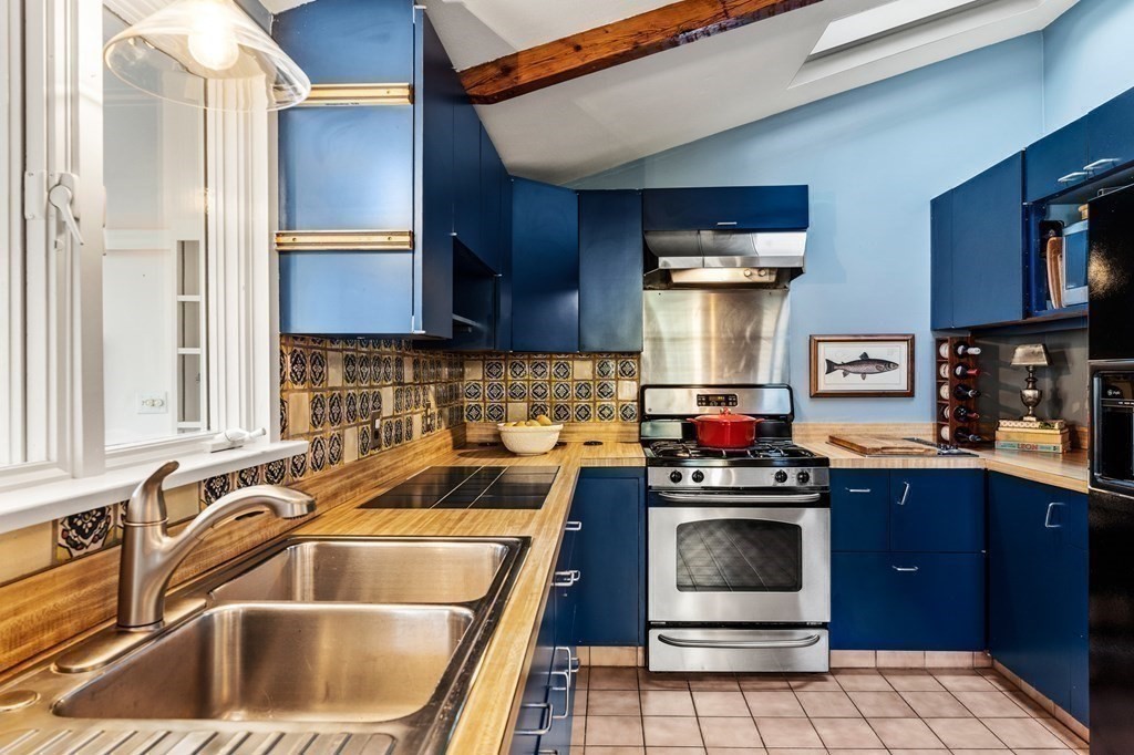 7 Circle Street Marblehead, MA 01945 - Photo 12 of 36 a kitchen that has a sink and a stove
