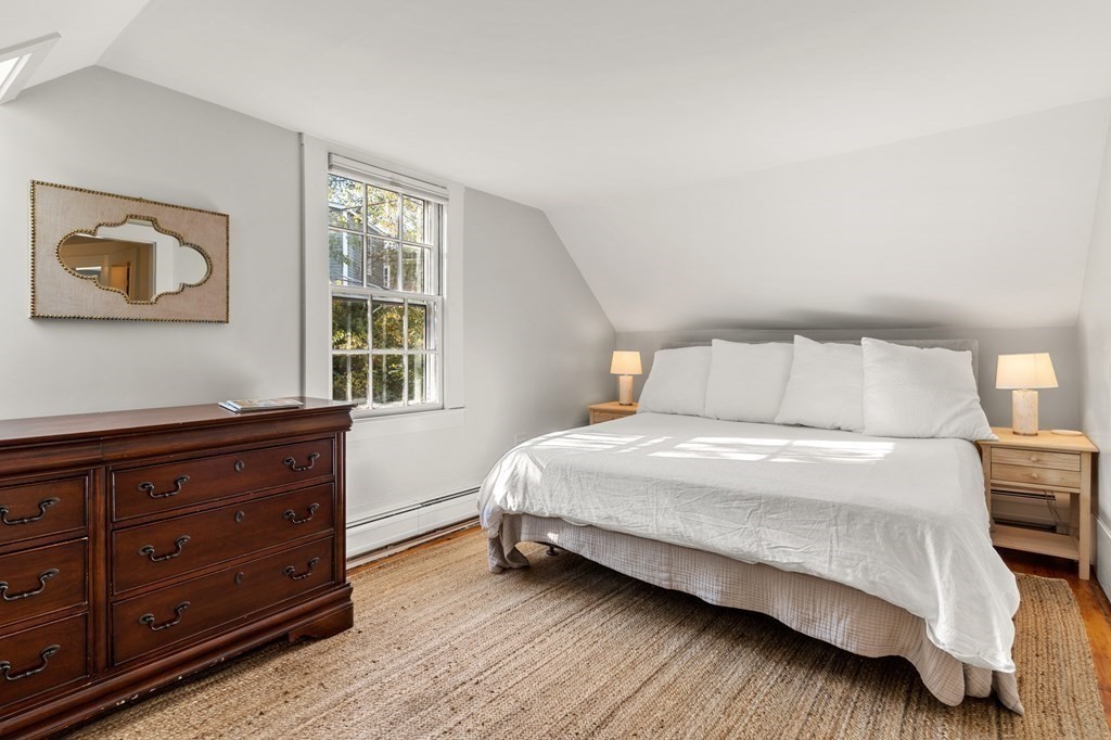 7 Circle Street Marblehead, MA 01945 - Photo 20 of 36 a bedroom with a bed and window