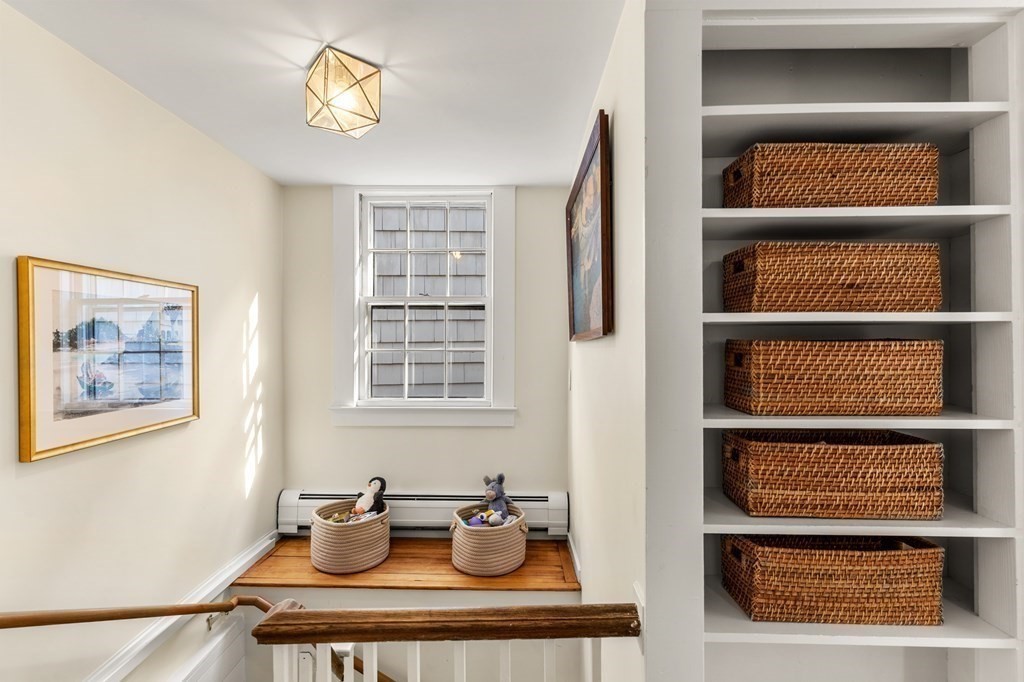 7 Circle Street Marblehead, MA 01945 - Photo 21 of 36 a room with furniture and a window