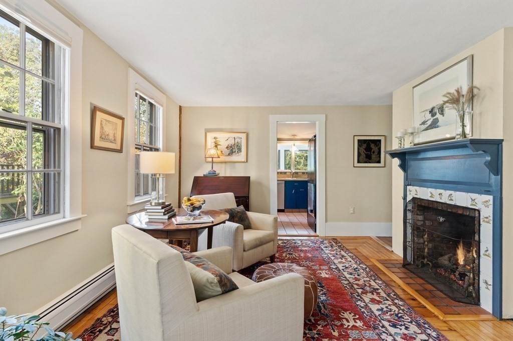 7 Circle Street Marblehead, MA 01945 - Photo 6 of 36 a living room with furniture a window and a fireplace