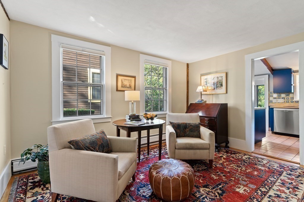 7 Circle Street Marblehead, MA 01945 - Photo 7 of 36 a living room with furniture and a window