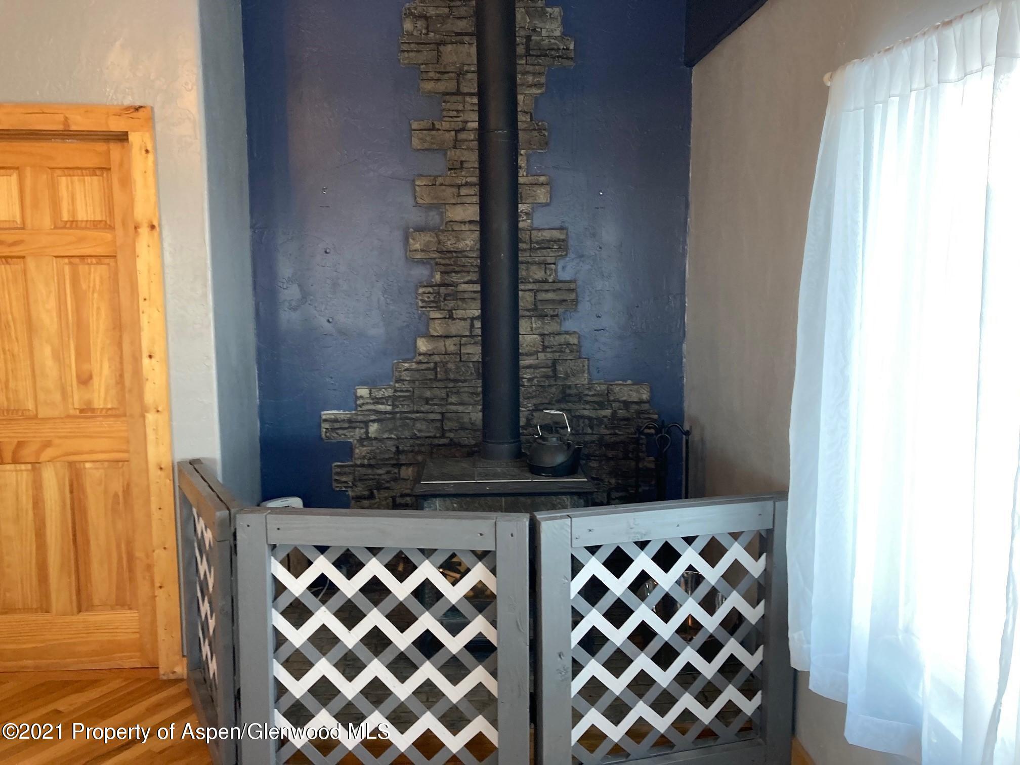 4361 Grass Mesa Road Rifle, CO 81650 - Photo 10 of 22 wood stove